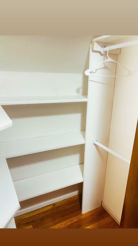 Custom closet system with hanging and drawer storage