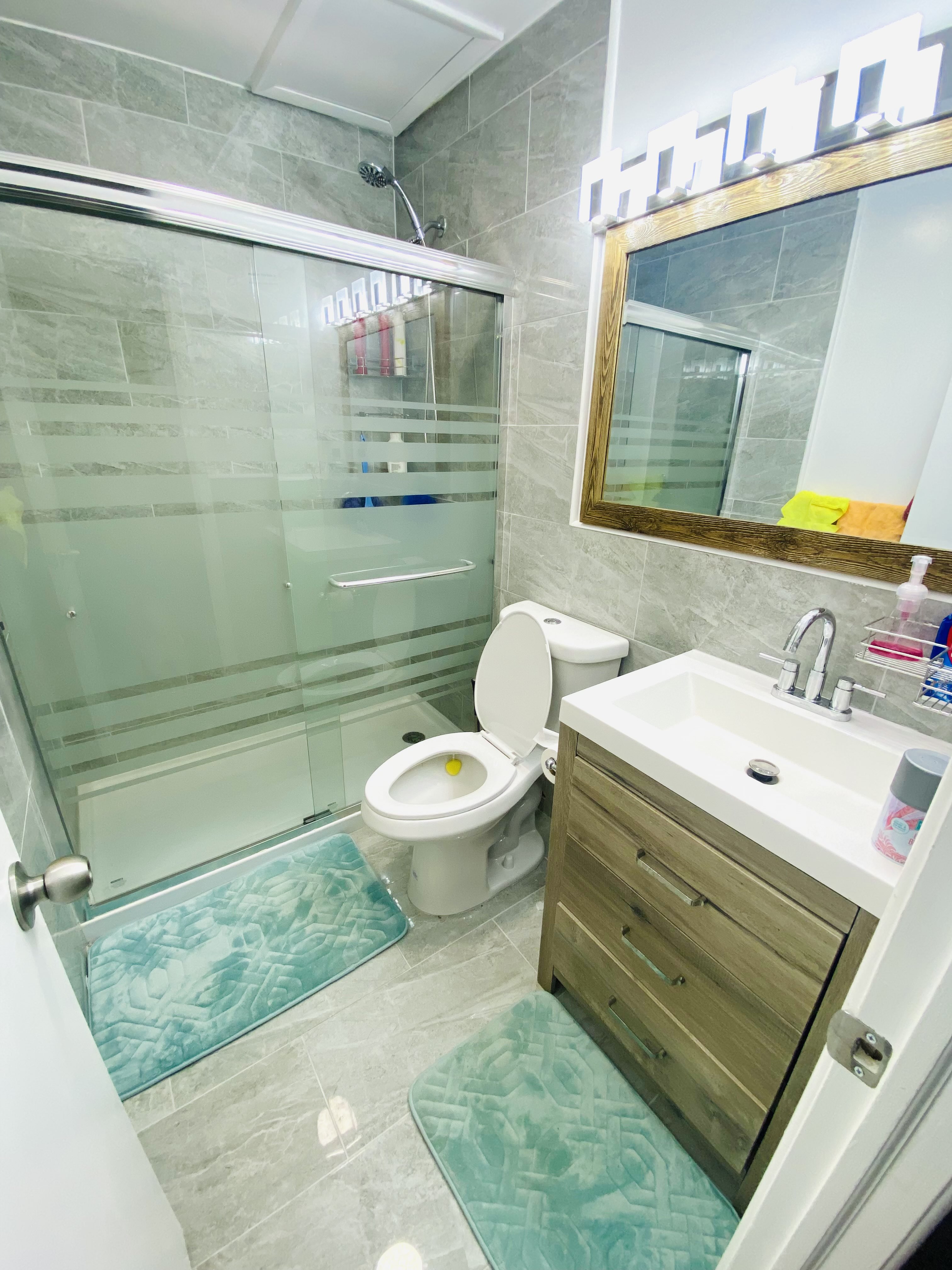 Bathroom remodel — orange tile bathroom before renovation